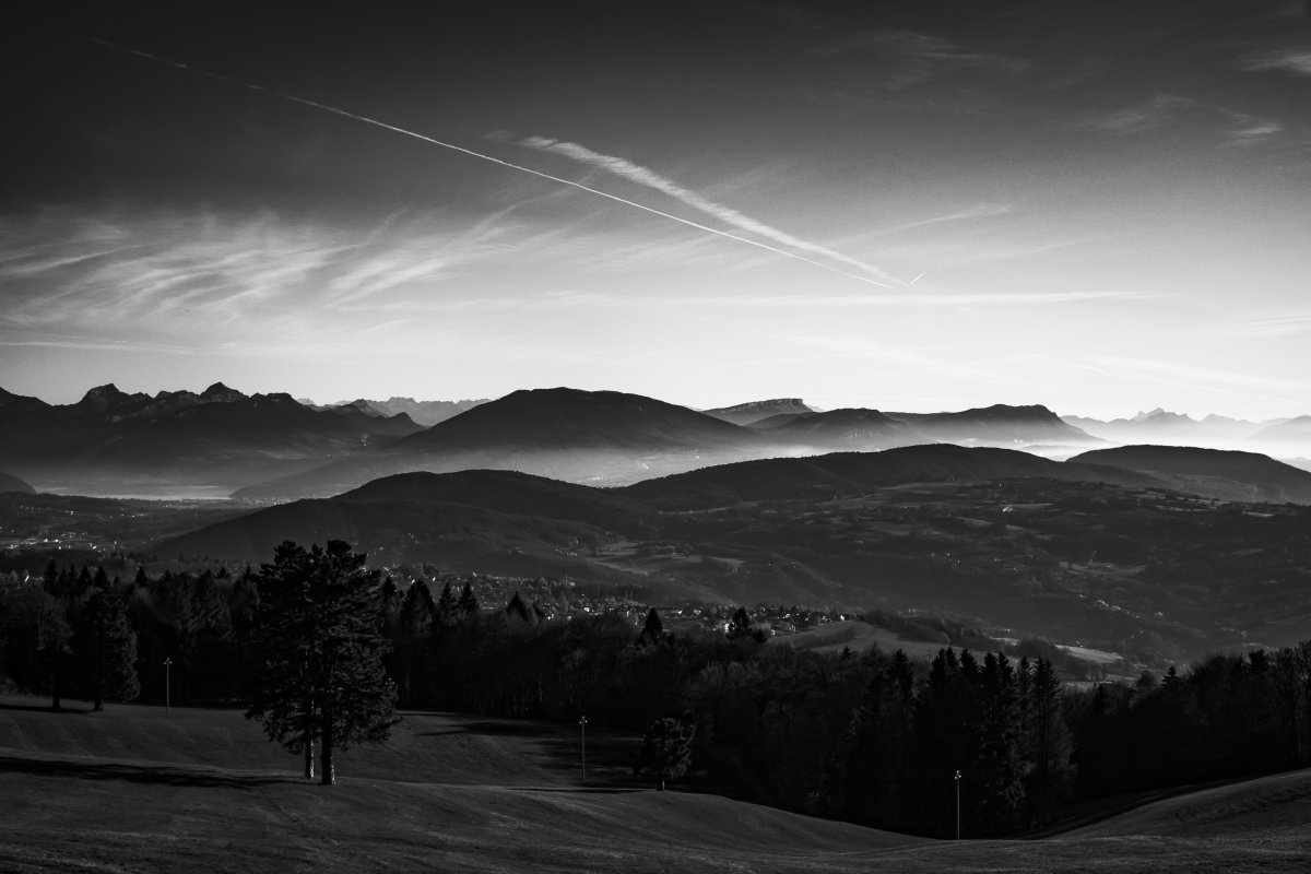 Black and white landscape pictures of rolling mountains