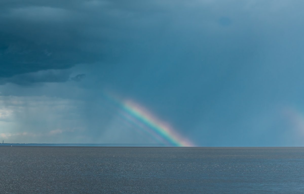 Rainbow pictures on the sea