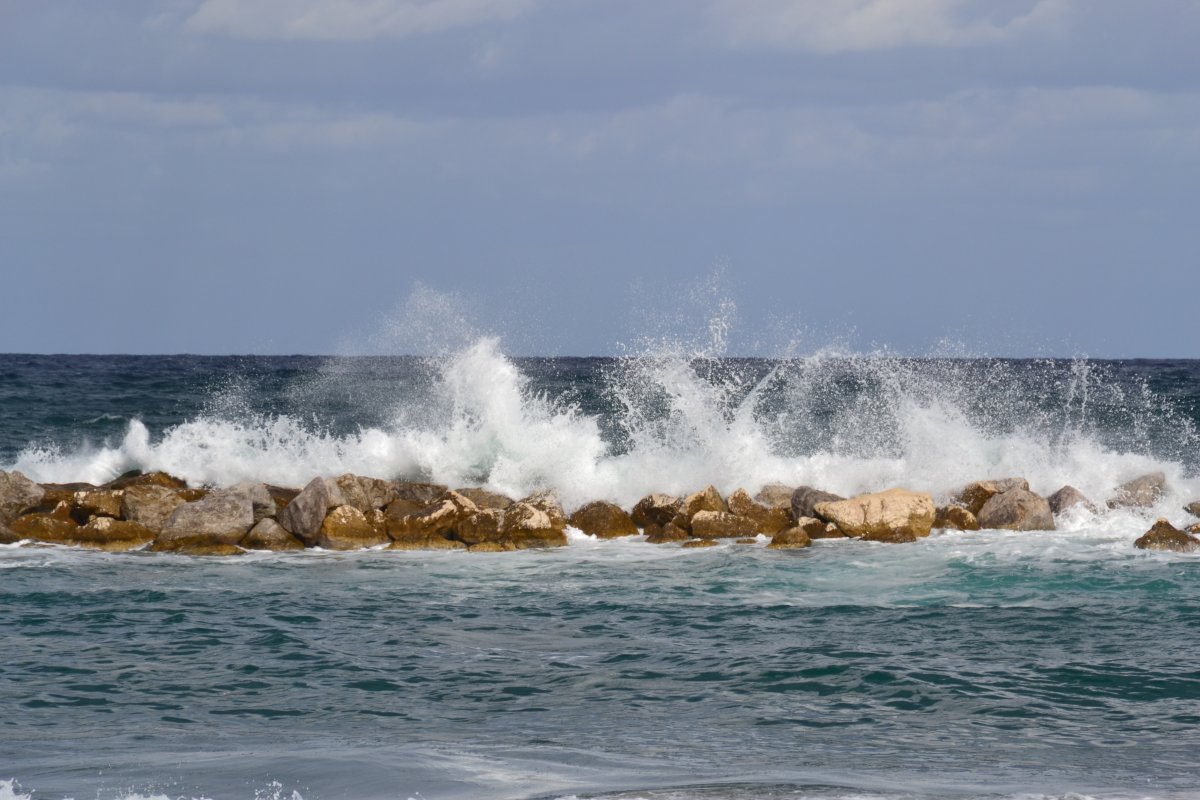 Pictures of waves hitting rocks