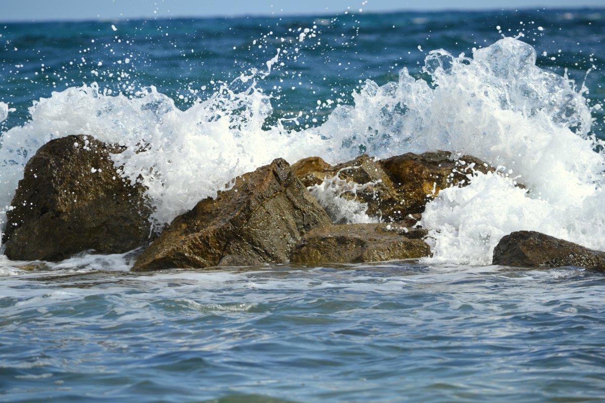 Photography of sea waves hitting rocks