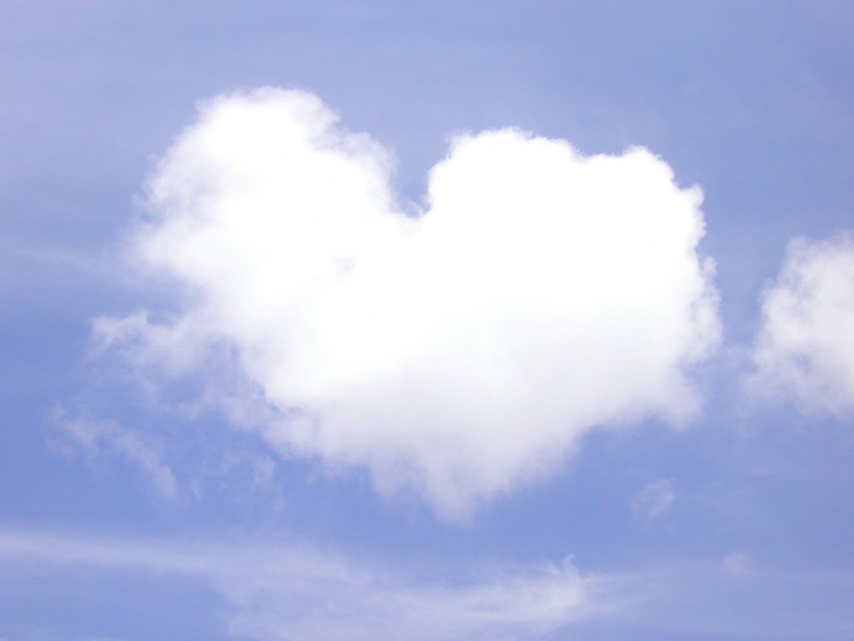 Heart shaped white clouds in the sky picture