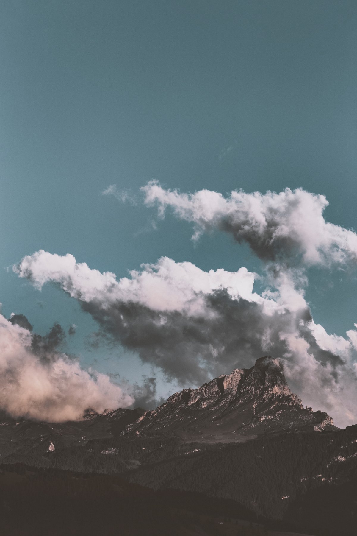 Clouds surrounding mountains pictures