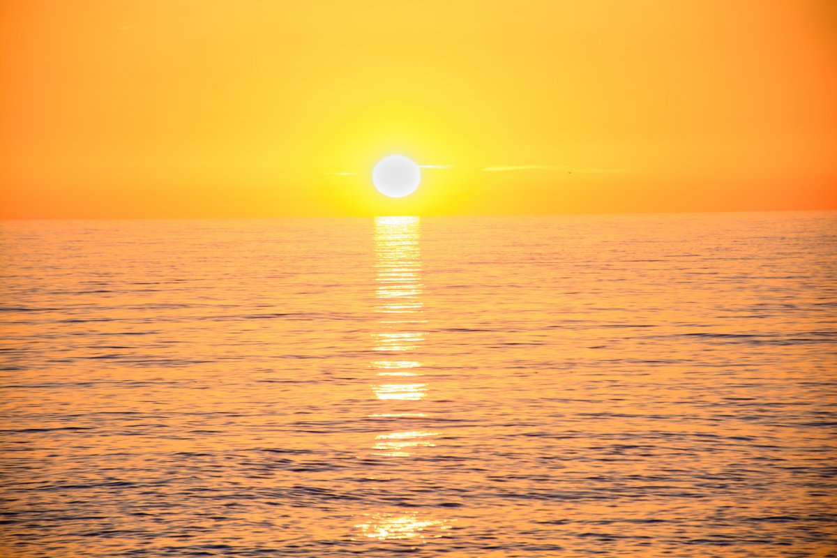 Yellow sunset picture on the sea
