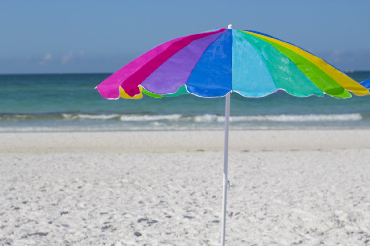 Pictures of colorful sun umbrellas on the beach