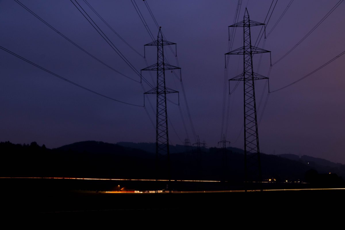 Landscape pictures of telephone poles at night