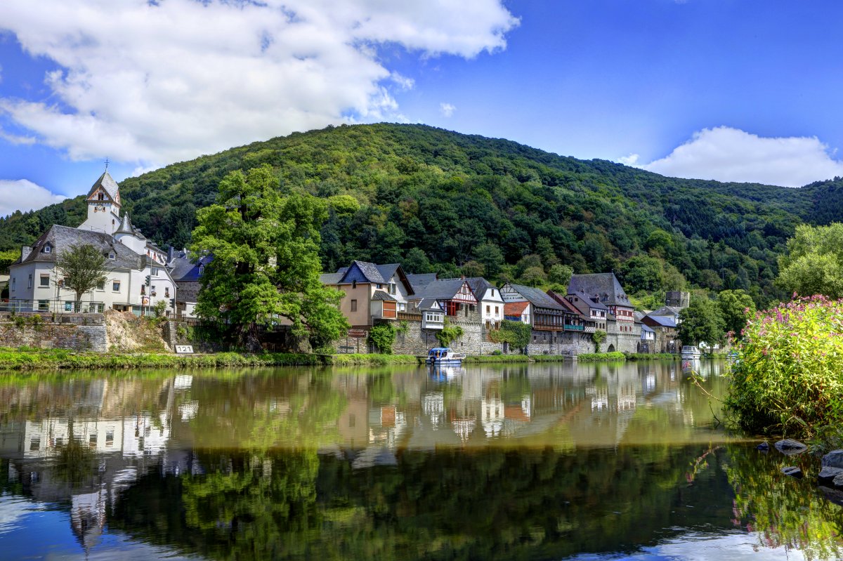 Pictures of European towns under green hillsides