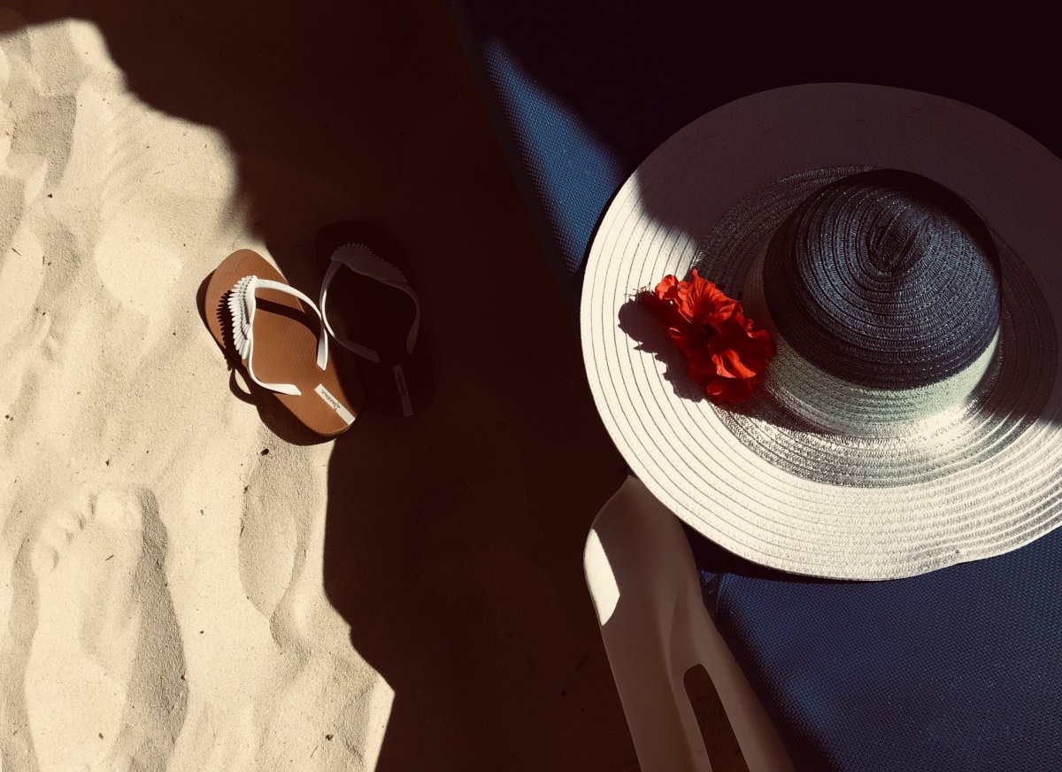 Beach straw hat and slippers pictures